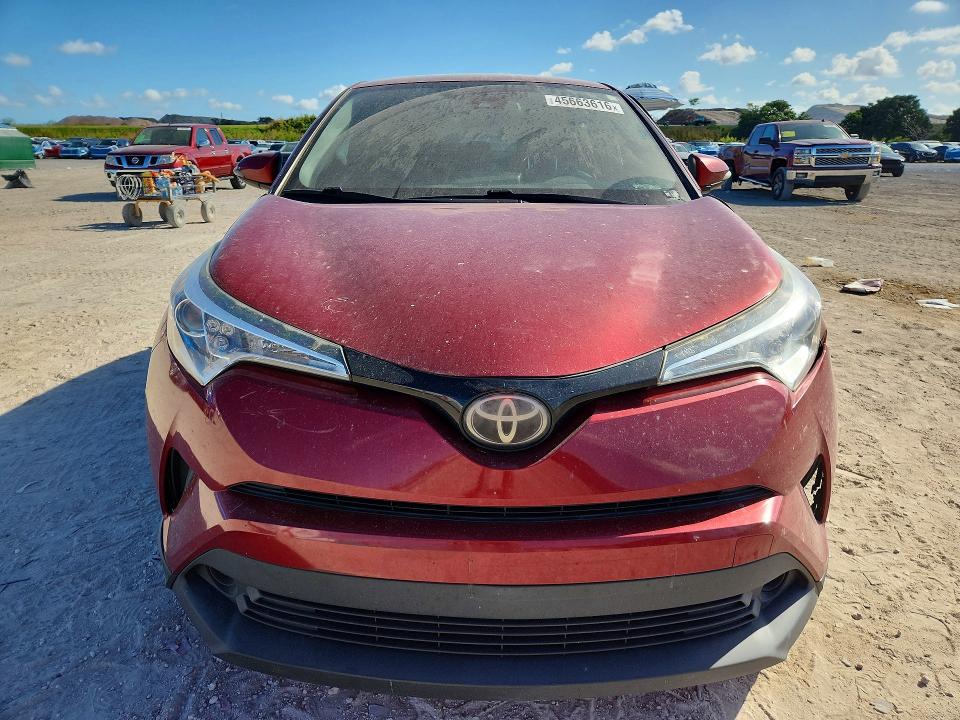 2018 Toyota C-hr VIN JTNKHMBXXJ1008164 COPART salvage auction — SIDE, Fl - Cert Of Title Slvg Rebuildable, sold $3,900 on 2026-08-01 (photo 5)