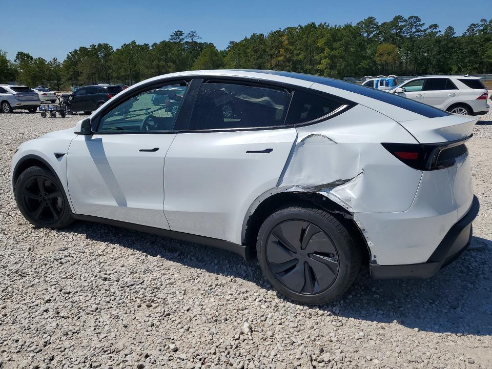 2026 Tesla Model y VIN 7SAYGDEE4TA449584 COPART salvage auction — SIDE, Tx - Certificate Of Title, sold $20,800 on 2026-09-22 (photo 2)