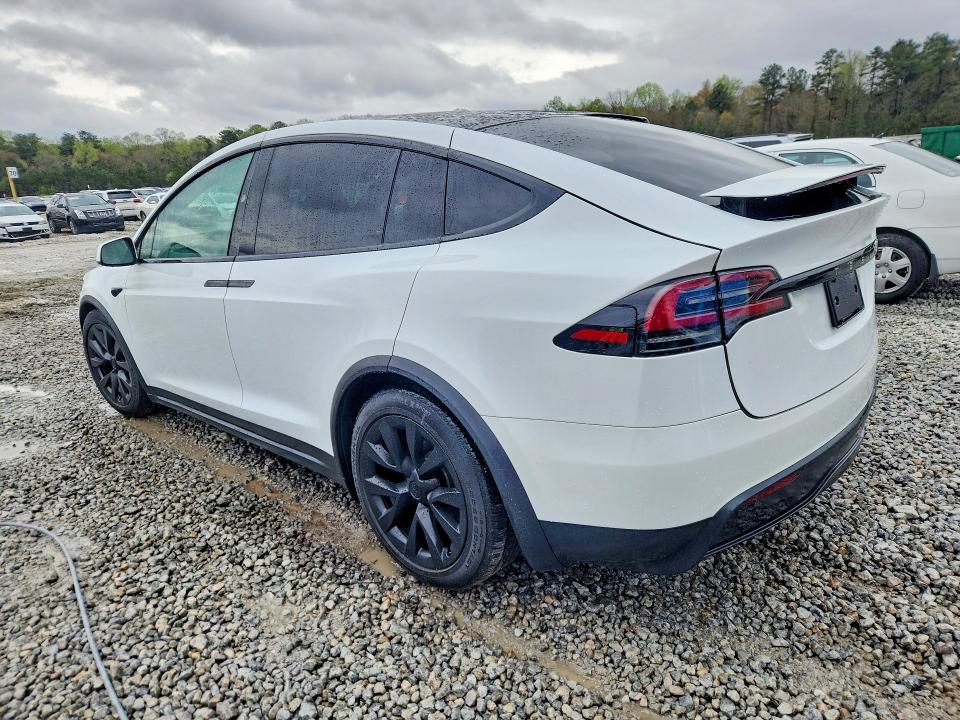 2023 Tesla Model x VIN 7SAXCAE56PF400157 COPART salvage auction — SIDE, Ga - Certificate Of Title, sold $24,600 on 2026-08-28 (photo 2)