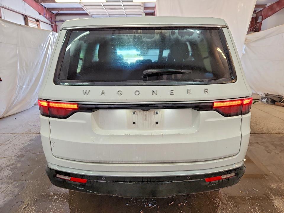 2023 Jeep Grand wagoneer VIN 1C4SJUAP7PS584677 COPART salvage auction — MINOR DENT/SCRATCHES, Tx - Certificate Of Title, sold $30,250 on 2026-07-28 (photo 6)
