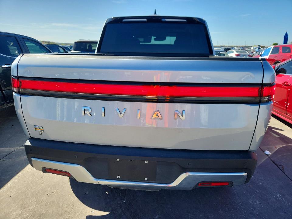 2023 Rivian R1t VIN 7FCTGAAA6PN021299 COPART salvage auction — FRONT END, TX - SALVAGE VEHICLE TITLE, sold $12,900 on 2026-07-09 (photo 6)
