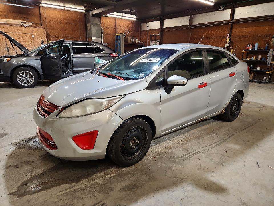 2013 Ford Fiesta VIN 3FADP4BJ8DM207383 — COPART salvage auction photo