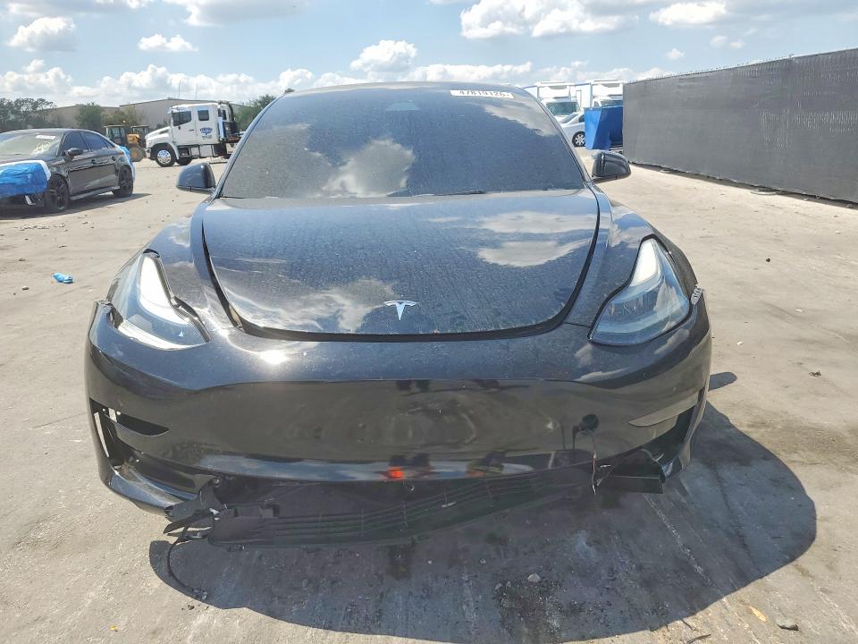 2023 Tesla Model 3 VIN 5YJ3E1EA9PF459769 COPART salvage auction — FRONT END, Fl - Certificate Of Destruction, sold $7,100 on 2026-07-09 (photo 5)