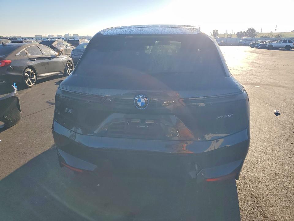 2025 BMW Ix VIN WB523CF07SCS50339 COPART salvage auction — FRONT END, Ca - Salvage Certificate, sold $27,250 on 2026-07-06 (photo 6)