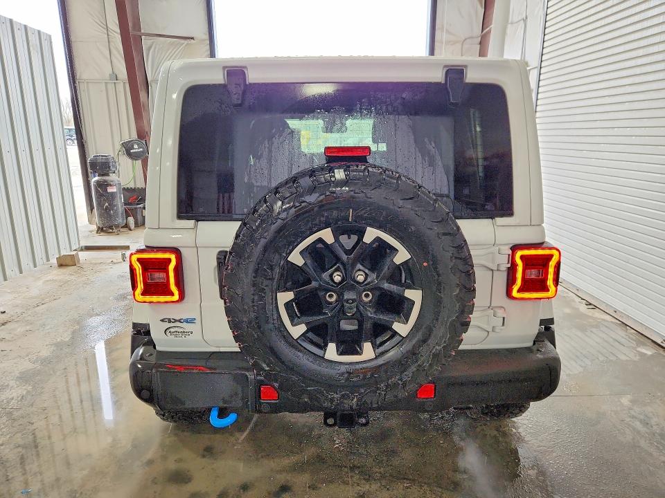 2024 Jeep Wrangler / VIN 1C4RJXR62RW200683 COPART salvage auction — NORMAL WEAR, Mo - Certificate Of Title, sold $30,500 on 2026-07-09 (photo 6)