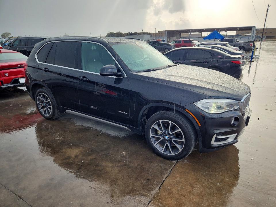 2018 BMW X5 VIN 5UXKR2C51J0Z15537 COPART salvage auction — NORMAL WEAR, TX - CERTIFICATE OF TITLE, sold $7,300 on 2026-07-30 (photo 4)