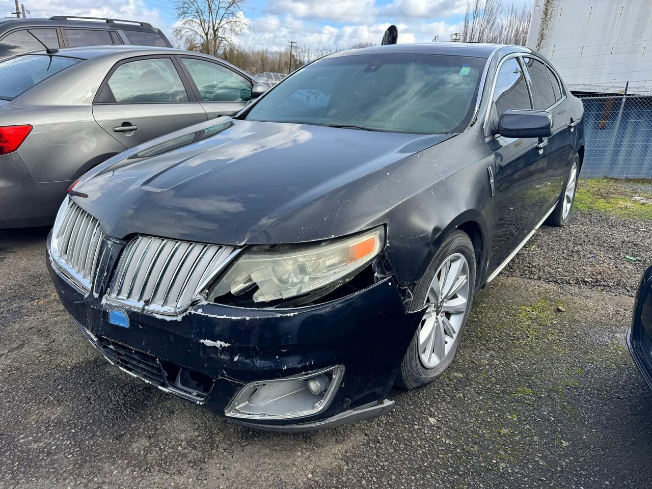 2009 Lincoln MKS VIN 1LNHM94RX9G608922 COPART salvage auction — Front End, OR - SALVAGE TITLE CERTIFICATE (P), sold $1,300 on 2026-04-08 (photo 2)