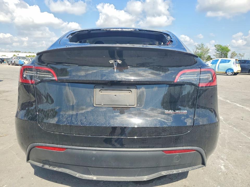 2025 Tesla Model y VIN 7SAYGDEF8SA348250 COPART salvage auction — FRONT END, FL, sold $13,500 on 2026-07-14 (photo 6)