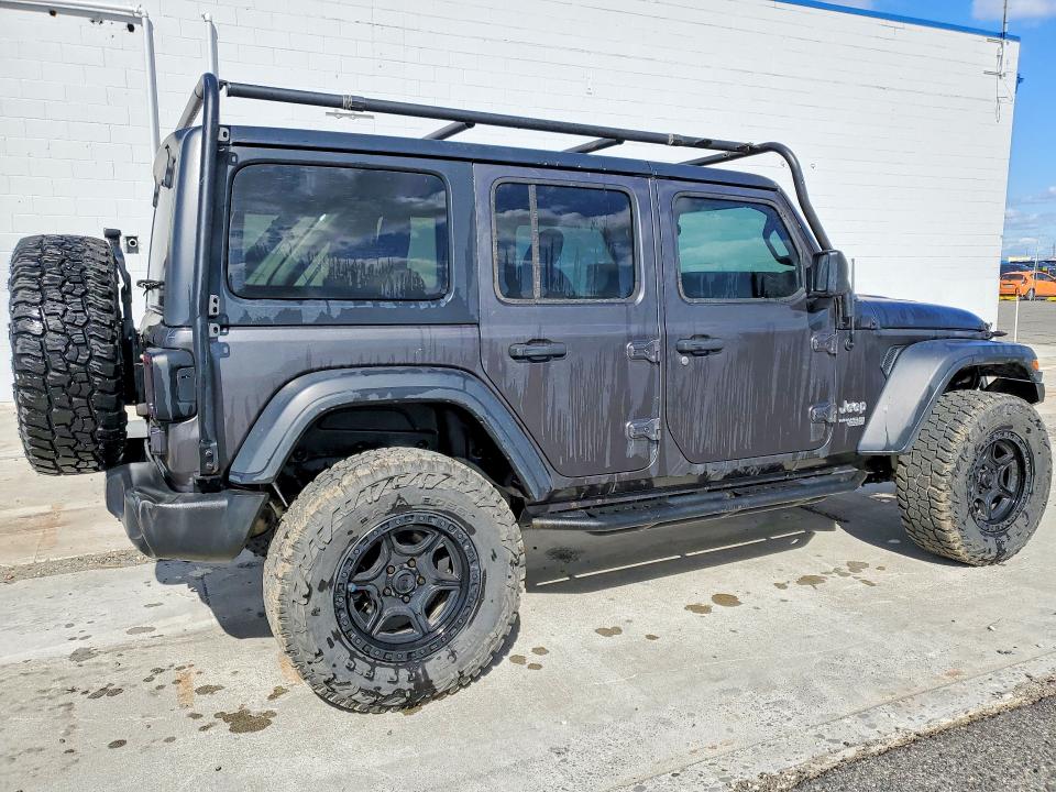 2018 Jeep Wrangler unlimited VIN 1C4HJXDGXJW198987 COPART salvage auction — MINOR DENT/SCRATCHES, Wa - Vehicle Cert Of Ownership-Titl, sold $14,100 on 2026-07-02 (photo 3)