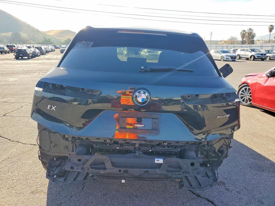 2024 BMW Ix VIN WB523CF04RCN52035 COPART salvage auction — FRONT END, Ca - Dis/Dlr/Exp Only Clean Title, sold $18,500 on 2026-07-20 (photo 6)
