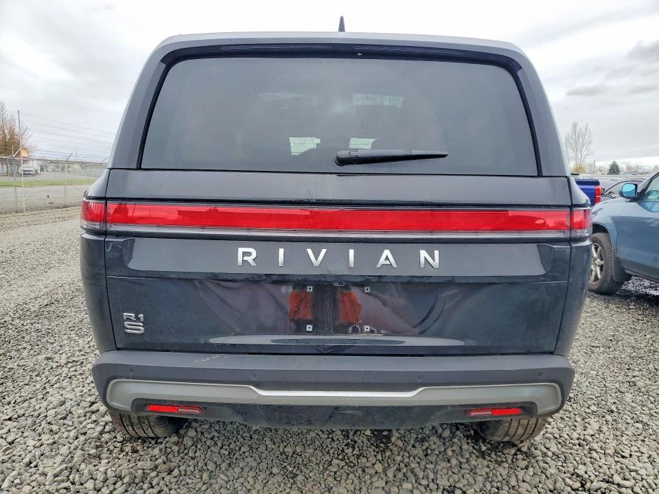 2025 Rivian VIN 7PDSGBBA5SN066855 COPART salvage auction — ROLLOVER, OR - LIEN PAPERS SALVAGE, sold $13,200 on 2026-08-25 (photo 6)