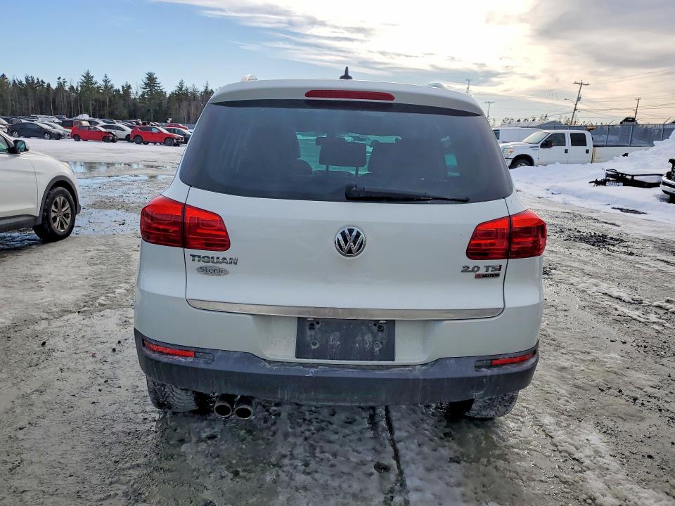 2017 Volkswagen Tiguan VIN WVGMV7AX7HK033838 COPART salvage auction — SIDE, Ns - Cert Of Registration, sold $2,800 on 2026-07-09 (photo 6)