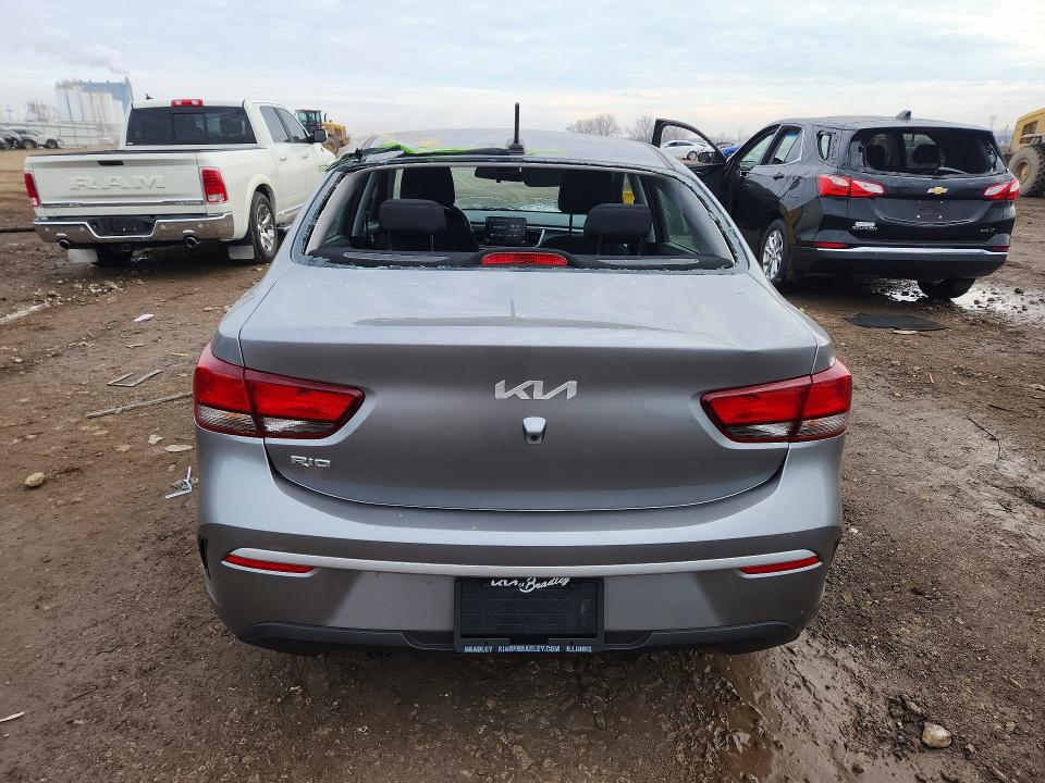 2023 Kia Rio VIN 3KPA24AD1PE588211 COPART salvage auction — HAIL, Il - Salvage Certificate, sold $5,200 on 2026-08-03 (photo 6)