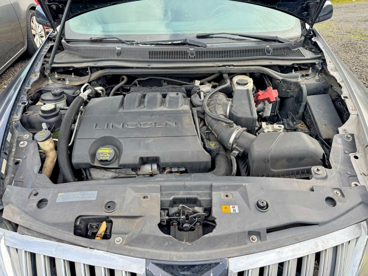 2009 Lincoln MKS VIN 1LNHM94RX9G608922 COPART salvage auction — Front End, OR - SALVAGE TITLE CERTIFICATE (P), sold $1,300 on 2026-04-08 (photo 7)