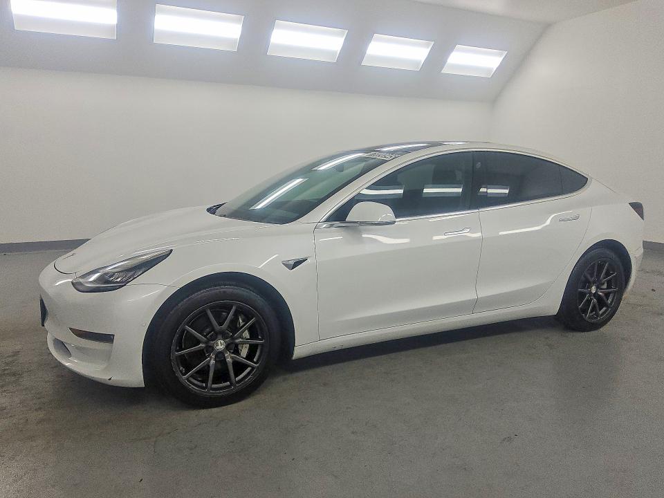 2019 Tesla Model 3 VIN 5YJ3E1EA2KF397351 COPART salvage auction — NORMAL WEAR, TX - CERTIFICATE OF TITLE (P), sold $14,000 on 2026-09-08 (photo 1)