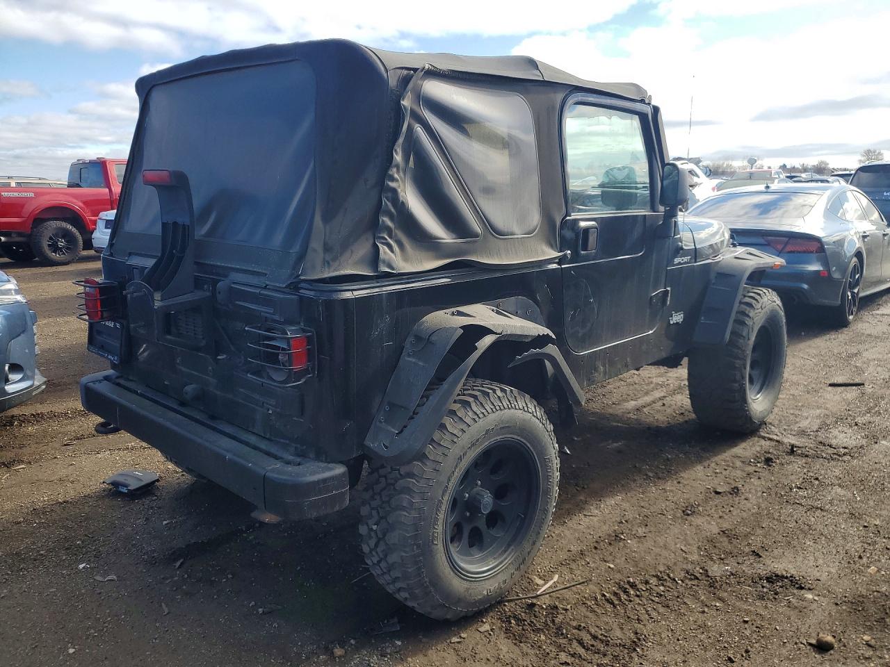 2004 Jeep Wrangler VIN 1J4FA49S84P801236 COPART salvage auction — Minor Dent/Scratches, IL - CERT OF TITLE-REBUILT, sold $2,950 on 2026-07-09 (photo 3)