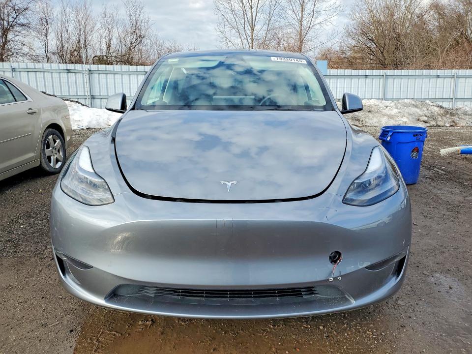 2025 Tesla Model y VIN 7SAYGAEE8SF229297 COPART salvage auction — UNDERCARRIAGE, Salvage Title, sold $14,200 on 2026-07-20 (photo 5)