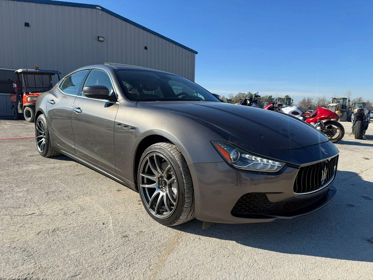 2017 Maserati Ghibli VIN ZAM57XSA9H1206127 COPART salvage auction — Damage History, Tx - Salvage Cert-Manufacturer Buyb (P), sold $25,000 on 2026-04-13 (photo 1)