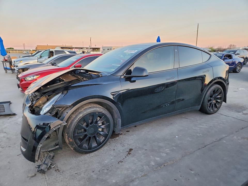 2023 Tesla Model y VIN 7SAYGDEE9PA094059 COPART salvage auction — FRONT END, TX - SALVAGE VEHICLE TITLE, sold $9,500 on 2026-08-03 (photo 1)