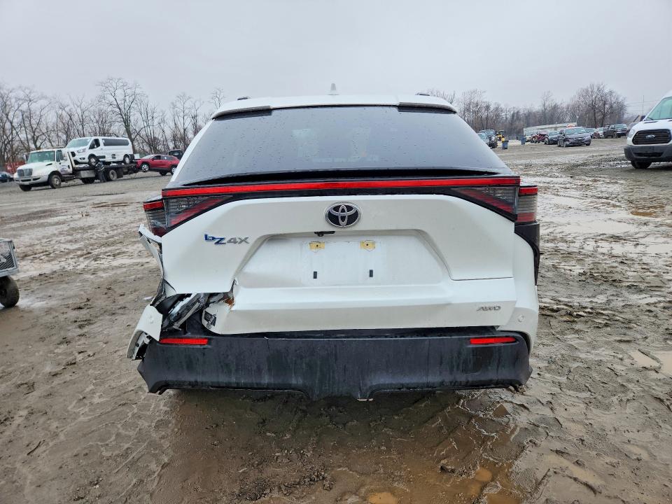2024 Toyota Bz4x VIN JTMABACA0RA075247 COPART salvage auction — UNDERCARRIAGE, Md - Cert Of Salvage > 75% Damage, sold $1,150 on 2026-07-23 (photo 6)