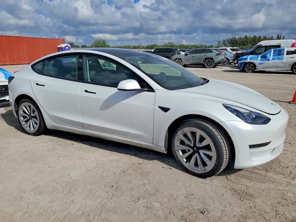 2023 Tesla Model 3 VIN 5YJ3E1EA8PF553741 COPART salvage auction — VANDALISM, Fl - Cert Of Title Slvg Rebuildable, sold $8,400 on 2026-07-08 (photo 4)