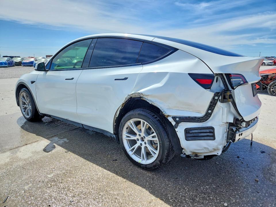 2021 Tesla Model Y VIN 5YJYGDEE1MF306898 COPART salvage auction — Rear End, TX - CERTIFICATE OF TITLE, sold $10,000 on 2026-05-19 (photo 2)