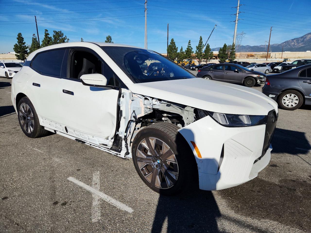 2026 BMW iX VIN WB543CF04TCV02588 COPART salvage auction — Front End, CA - SALVAGE CERTIFICATE, sold $35,500 on 2026-06-30 (photo 4)