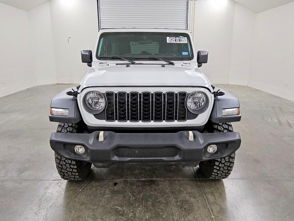 2025 Jeep Wrangler / VIN 1C4PJXDN3SW552358 COPART salvage auction — MINOR DENT/SCRATCHES, Tx - Certificate Of Title, sold $23,500 on 2026-07-09 (photo 5)