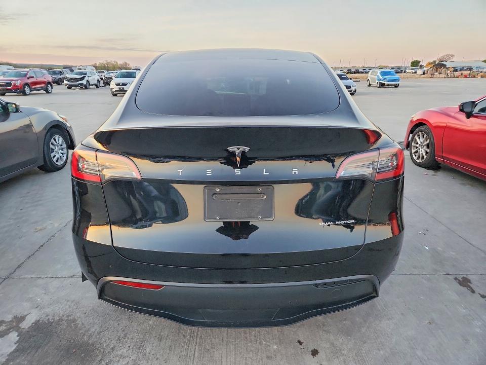 2023 Tesla Model y VIN 7SAYGDEE9PA094059 COPART salvage auction — FRONT END, TX - SALVAGE VEHICLE TITLE, sold $9,500 on 2026-08-03 (photo 6)