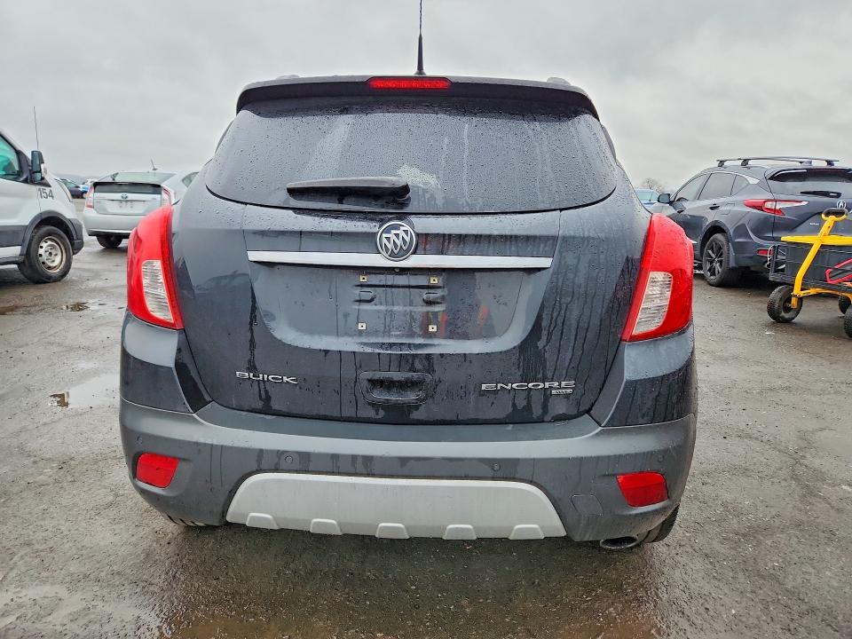 2013 Buick Encore VIN KL4CJHSB8DB113559 COPART salvage auction — ENGINE BURN, PA - CERTIFICATE OF SALVAGE, sold $400 on 2026-07-02 (photo 6)