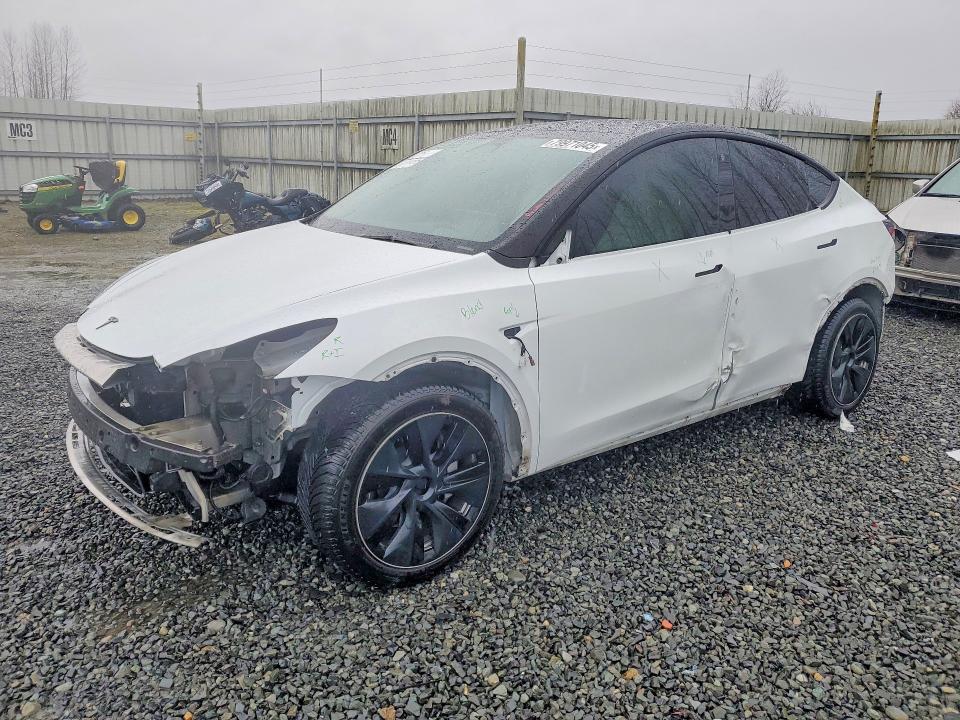 2023 Tesla Model y VIN 7SAYGDEE4PF628247 COPART salvage auction — SIDE, Salvage Title, sold $10,700 on 2026-07-13 (photo 1)