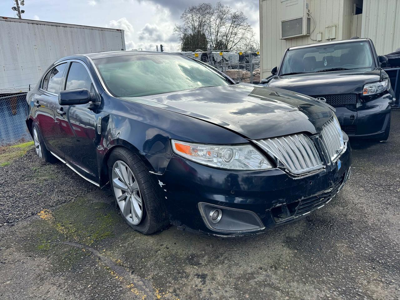 2009 Lincoln MKS VIN 1LNHM94RX9G608922 COPART salvage auction — Front End, OR - SALVAGE TITLE CERTIFICATE (P), sold $1,300 on 2026-04-08 (photo 1)