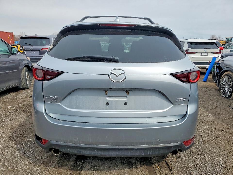 2019 Mazda Cx-5 VIN JM3KFBCM6K0601795 COPART salvage auction — SIDE, Salvage Title, sold $9,400 on 2026-07-16 (photo 6)