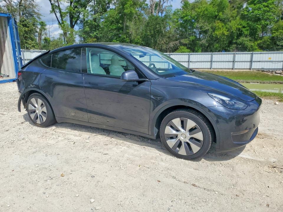 2024 Tesla Model y VIN 7SAYGAEE1RF045247 COPART salvage auction — REAR END, Fl - Cert Of Title Slvg Rebuildable, sold $10,700 on 2026-07-28 (photo 4)