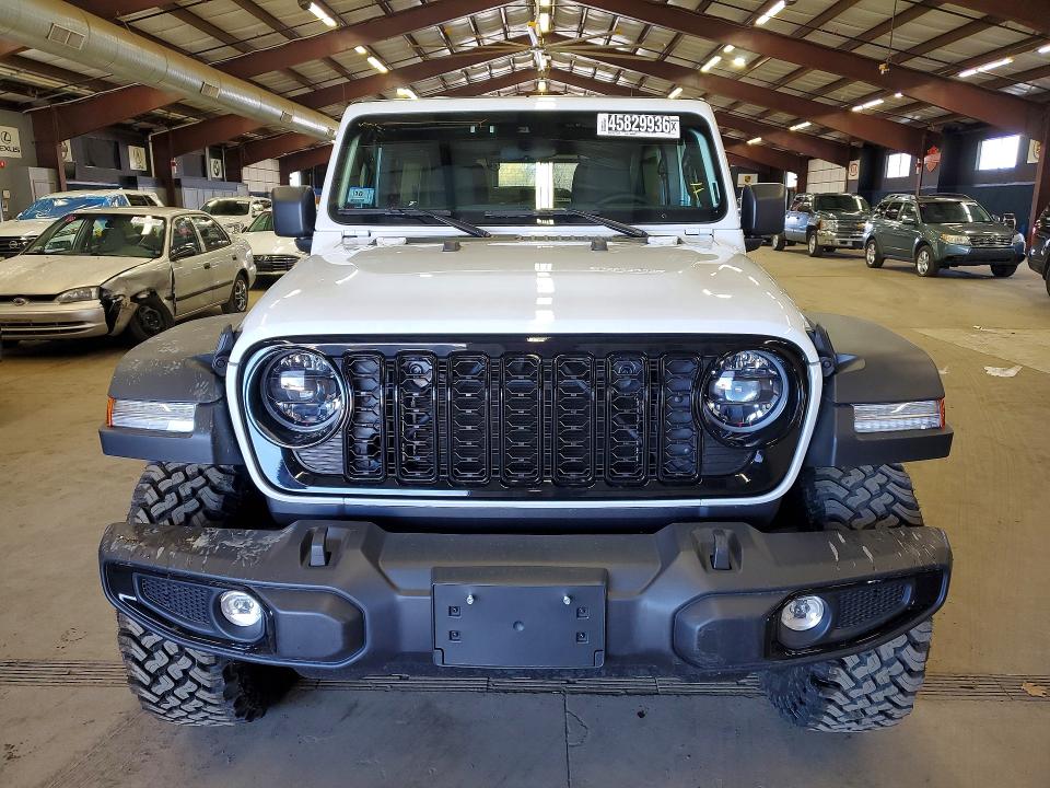 2025 Jeep Wrangler / VIN 1C4PJXDG3SW627545 COPART salvage auction — MINOR DENT/SCRATCHES, MA - CERTIFICATE OF TITLE, sold $22,750 on 2026-07-07 (photo 5)
