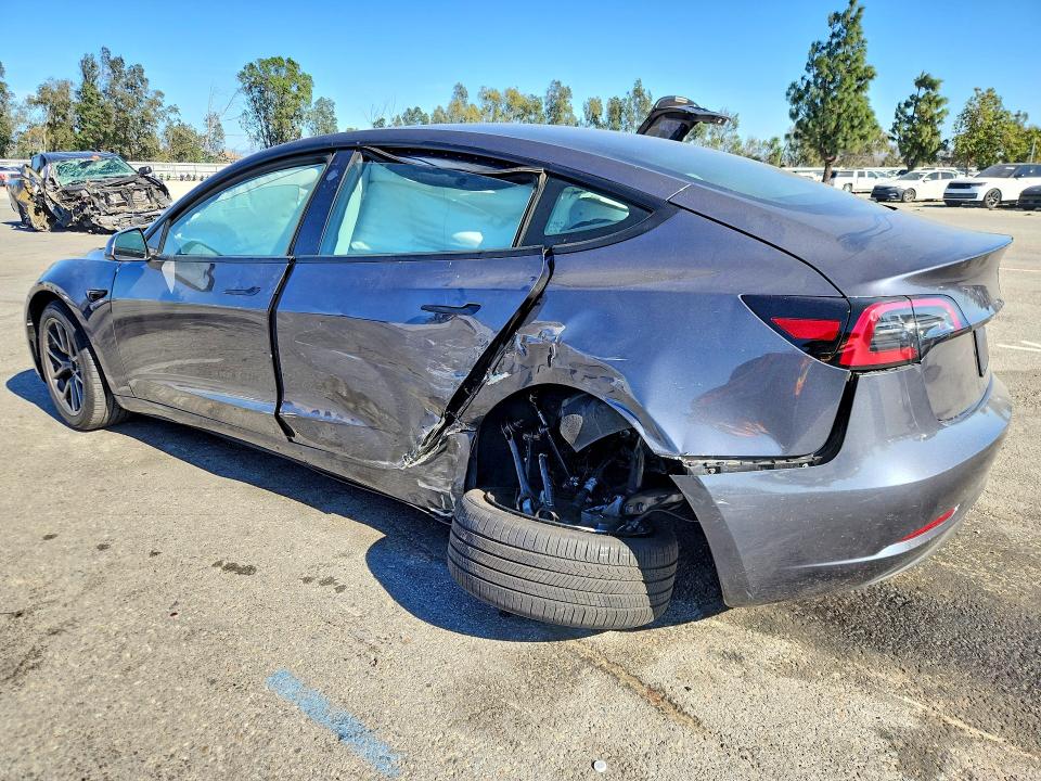 2023 Tesla Model 3 VIN 5YJ3E1EA1PF701227 COPART salvage auction — FRONT END, Salvage Title, sold $4,000 on 2026-07-09 (photo 2)