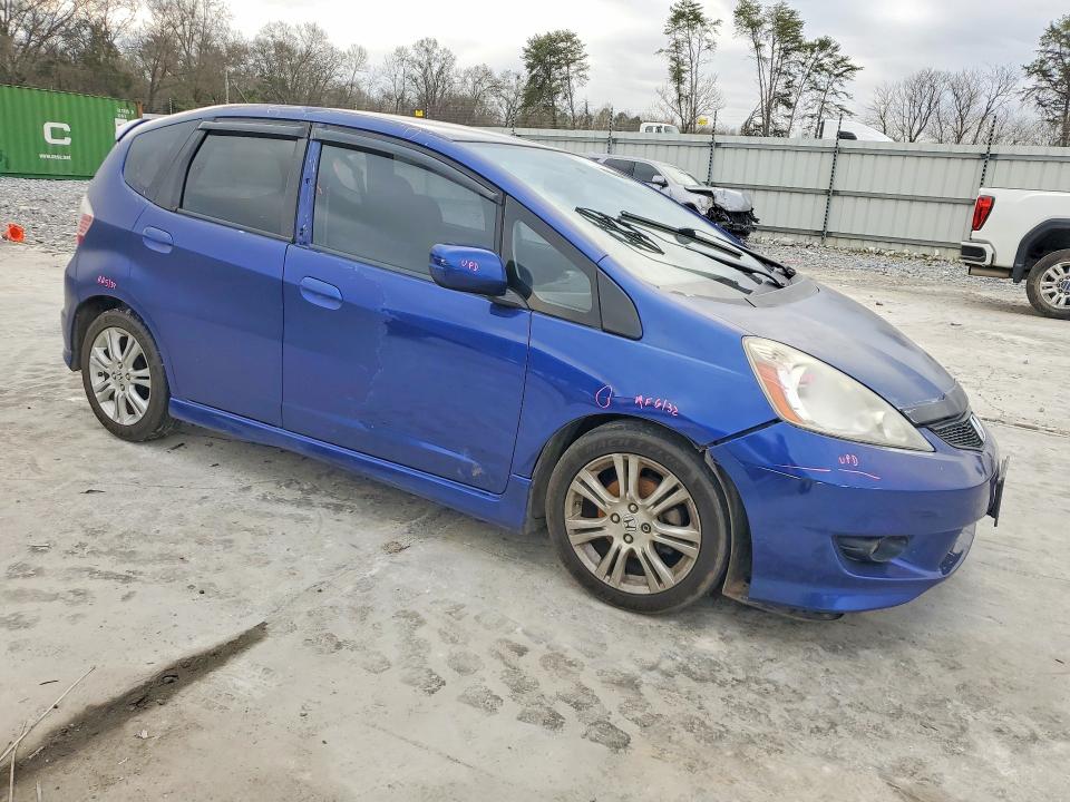 2009 Honda Fit VIN JHMGE886X9S056423 COPART salvage auction — SIDE, GA - CERT OF TITLE-SALVAGE, sold $575 on 2026-07-09 (photo 4)
