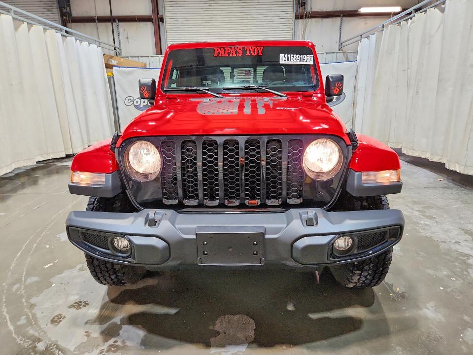 2023 Jeep Gladiator VIN 1C6HJTAG3PL567123 COPART salvage auction — NORMAL WEAR, Wv - Certificate Of Title, sold $25,250 on 2026-07-02 (photo 5)
