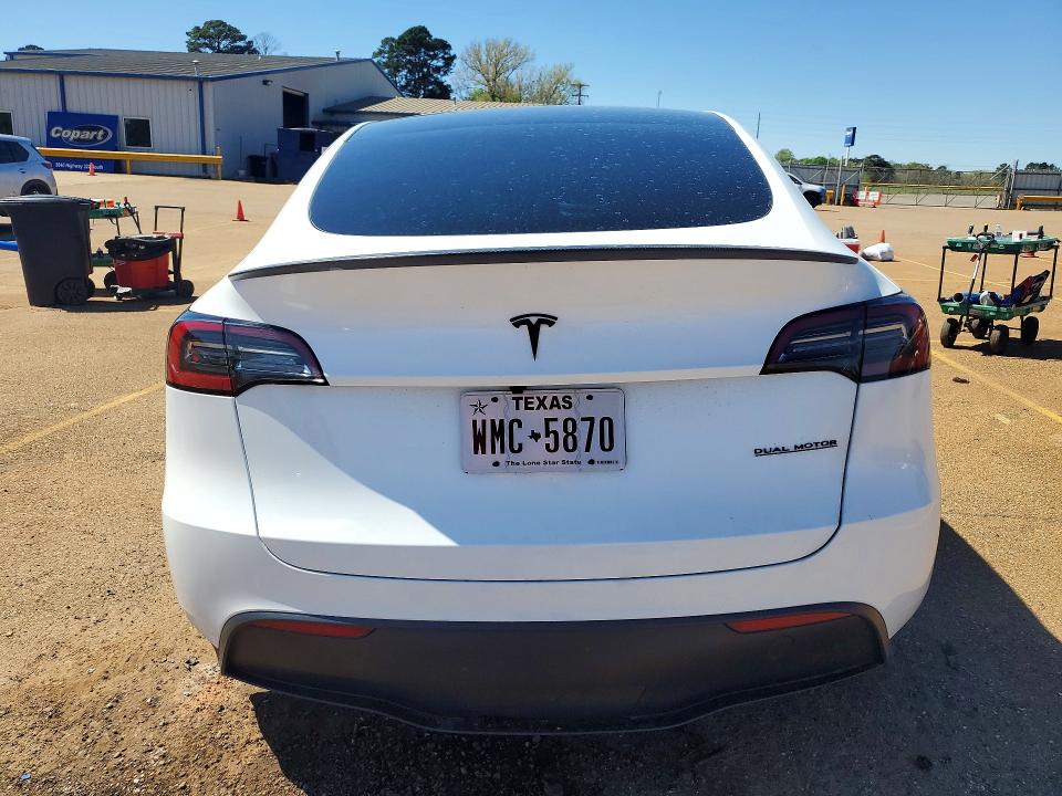 2025 Tesla Model y VIN 7SAYGDEF6SA378086 COPART salvage auction — FRONT END, Tx - Salvage Vehicle Title, sold $13,200 on 2026-07-13 (photo 6)