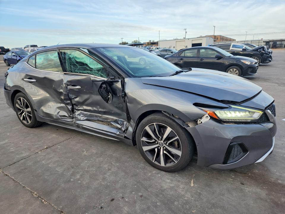2020 Nissan Maxima VIN 1N4AA6CV5LC360479 COPART salvage auction — SIDE, TX - SALVAGE VEHICLE TITLE, sold $1,350 on 2026-07-09 (photo 4)