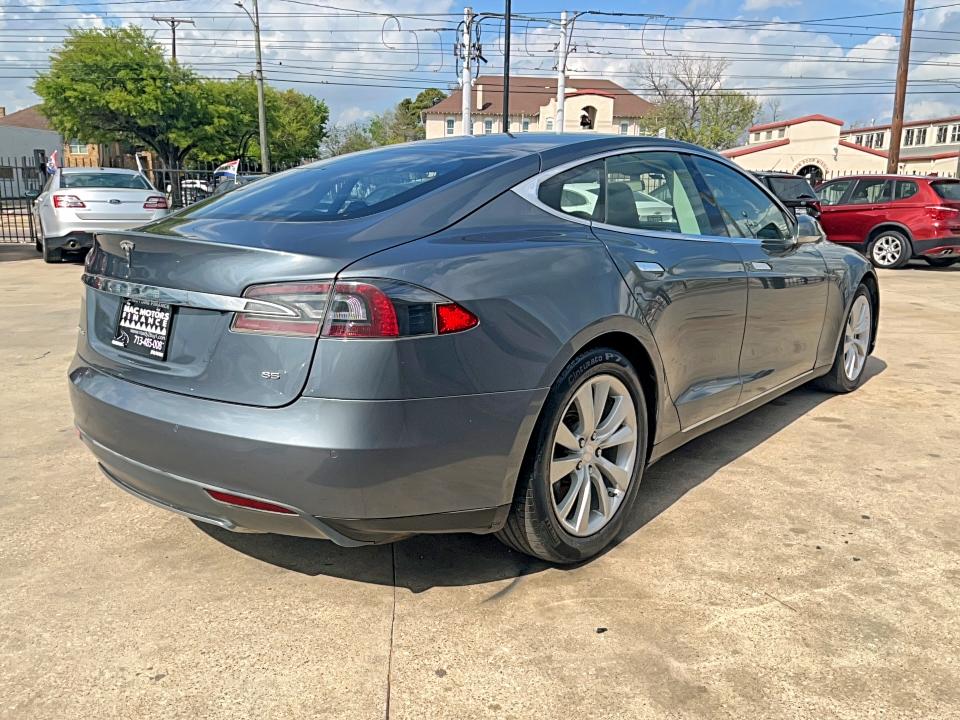 2013 Tesla Model s VIN 5YJSA1CN5DFP30142 COPART salvage auction — DAMAGE HISTORY, Ca - Certificate Of Title (P), sold $5,500 on 2026-07-09 (photo 4)