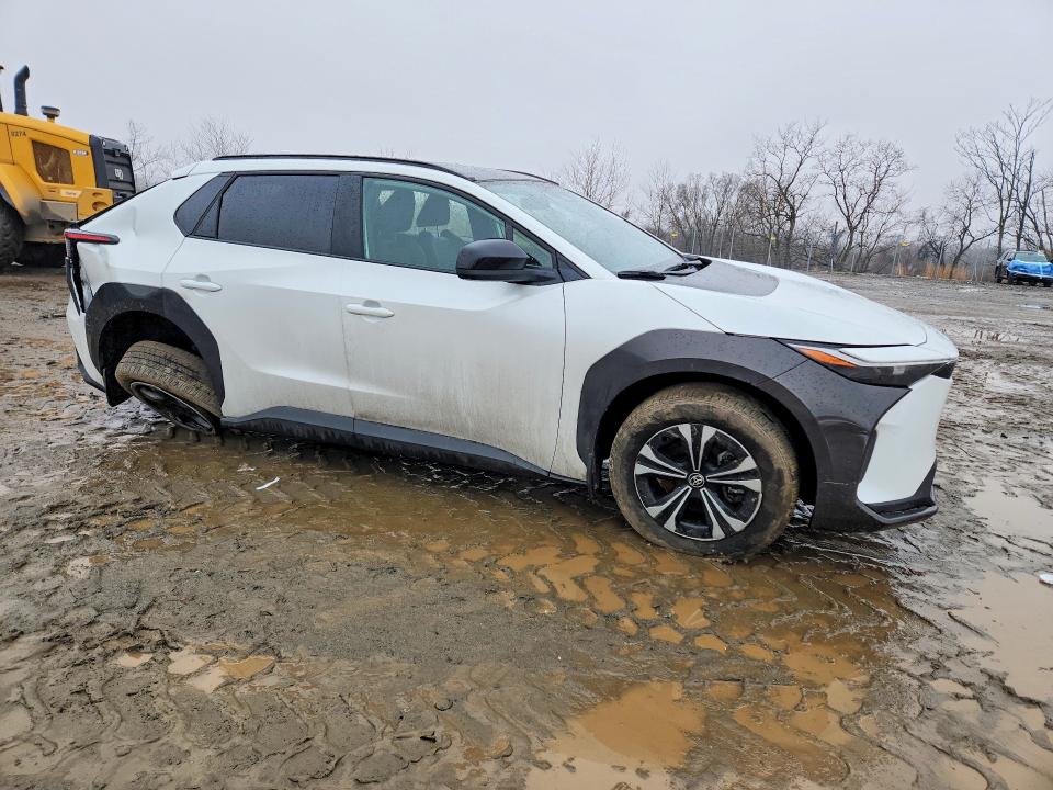 2024 Toyota Bz4x VIN JTMABACA0RA075247 COPART salvage auction — UNDERCARRIAGE, Md - Cert Of Salvage > 75% Damage, sold $1,150 on 2026-07-23 (photo 4)
