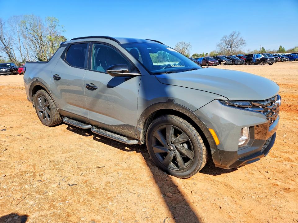 2023 Hyundai Santa cruz VIN 5NTJCDAF0PH071428 COPART salvage auction — FRONT END, Nc - Salvage Certificate Of Title, sold $10,400 on 2026-07-13 (photo 4)