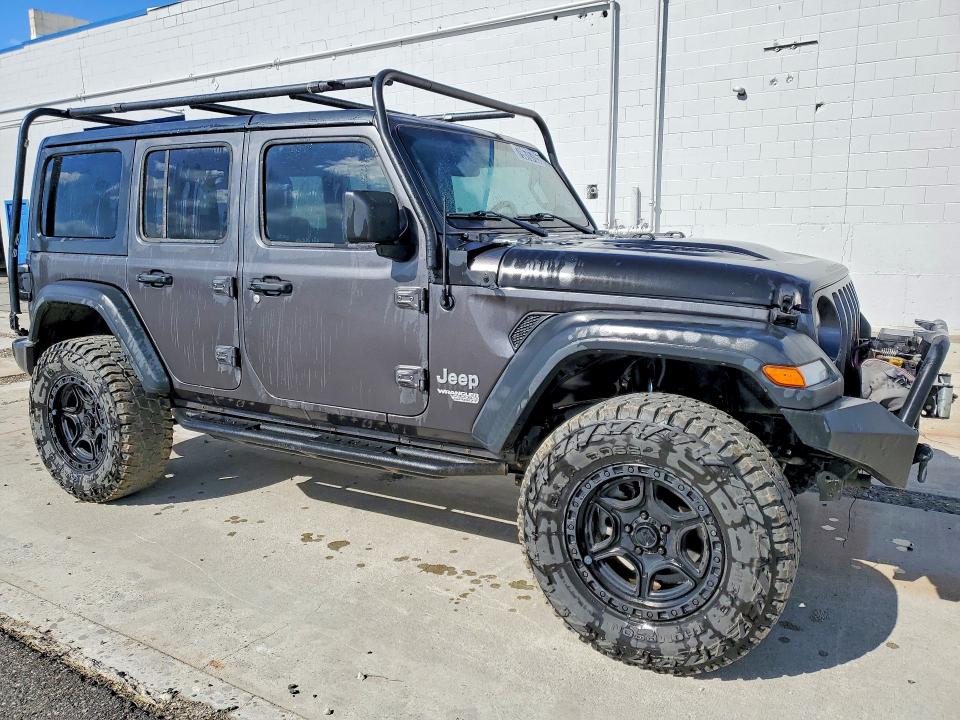 2018 Jeep Wrangler unlimited VIN 1C4HJXDGXJW198987 COPART salvage auction — MINOR DENT/SCRATCHES, Wa - Vehicle Cert Of Ownership-Titl, sold $14,100 on 2026-07-02 (photo 4)