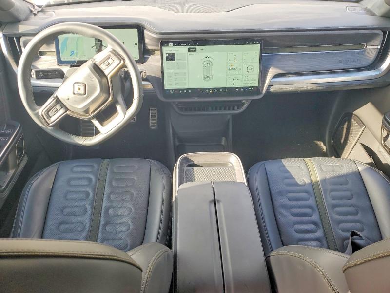 2023 Rivian R1s VIN 7PDSGABA4PN017518 COPART salvage auction — SIDE, Or - Salvage Title Certificate, sold $23,200 on 2026-07-13 (photo 8)