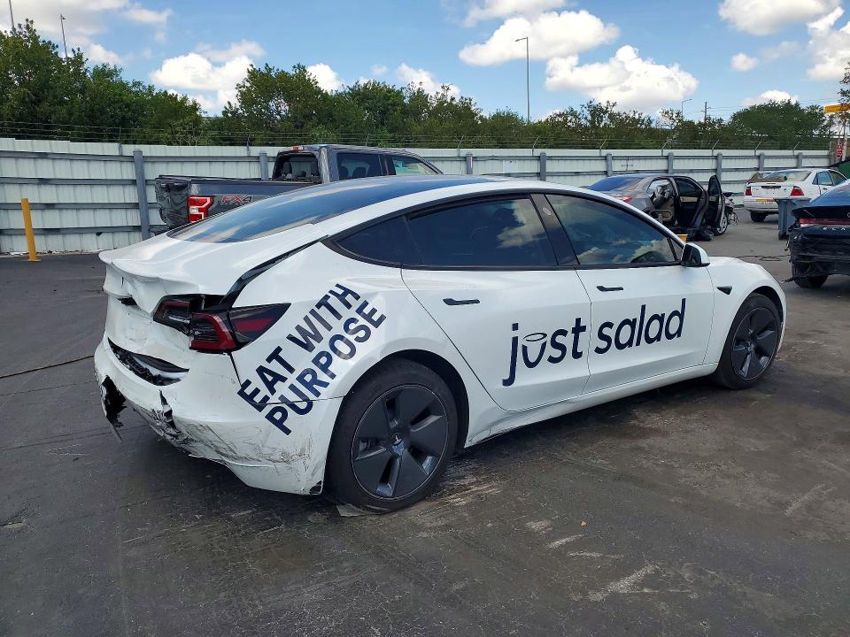 2023 Tesla Model 3 VIN 5YJ3E1EA9PF554834 COPART salvage auction — REAR END, Fl - Cert Of Title Slvg Rebuildable, sold $3,100 on 2026-07-13 (photo 3)