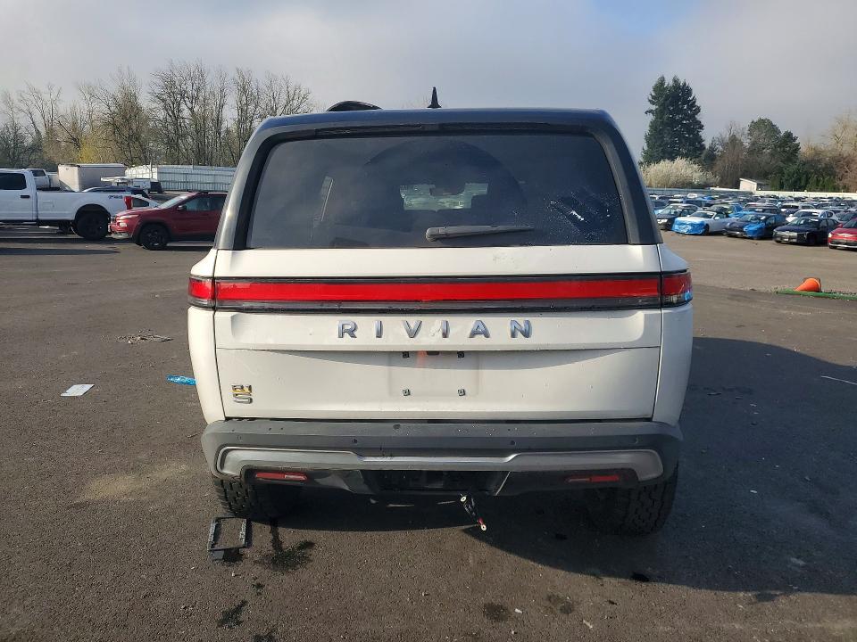 2023 Rivian R1s VIN 7PDSGABA4PN017518 COPART salvage auction — SIDE, Or - Salvage Title Certificate, sold $23,200 on 2026-07-13 (photo 6)
