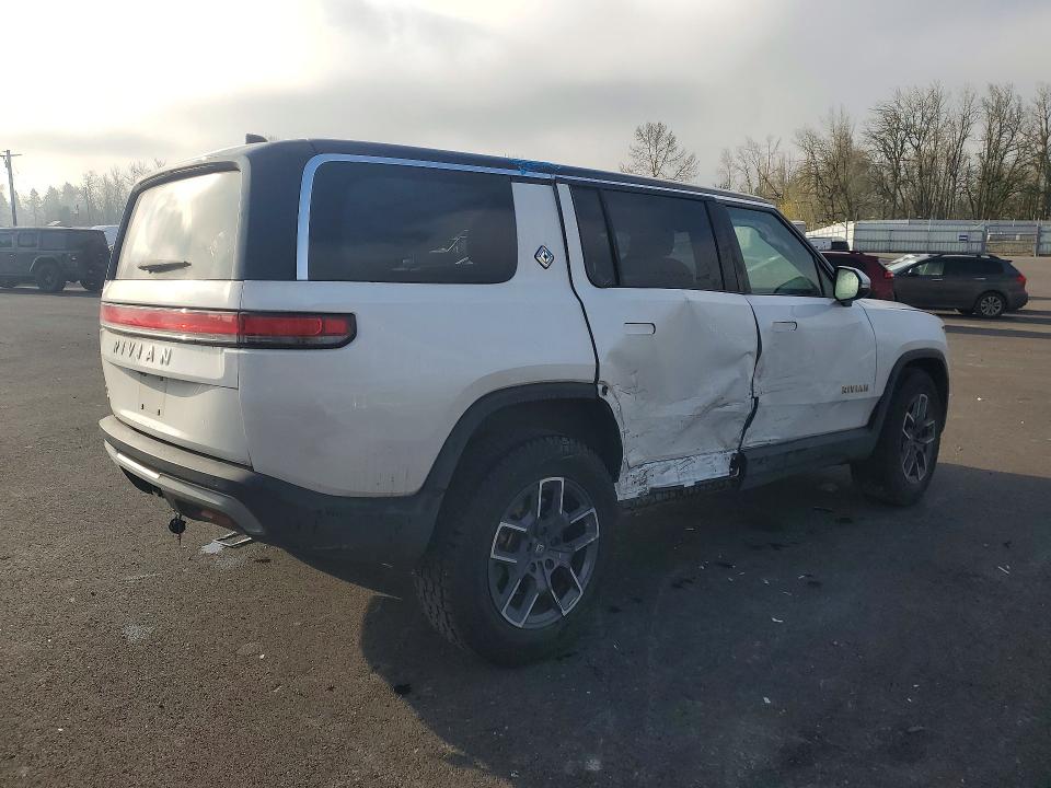 2023 Rivian R1s VIN 7PDSGABA4PN017518 COPART salvage auction — SIDE, Or - Salvage Title Certificate, sold $23,200 on 2026-07-13 (photo 3)
