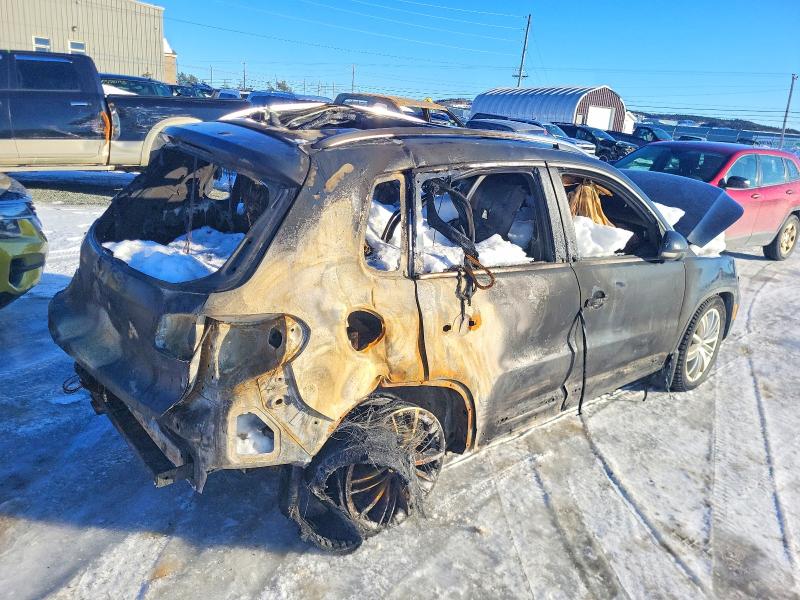 2016 Volkswagen Tiguan VIN WVGJV7AX8GW500565 COPART salvage auction — BURN, Nl - Non-Repairable, sold $80 on 2026-08-06 (photo 3)