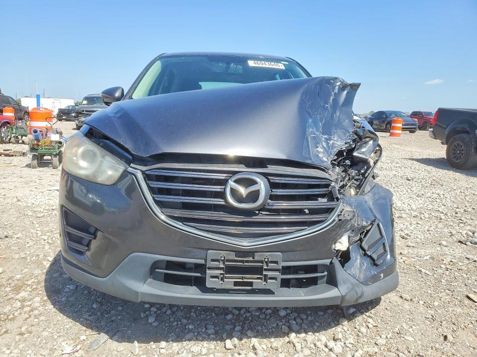 2016 Mazda Cx-5 VIN JM3KE2BY9G0631761 COPART salvage auction — FRONT END, TX - SALVAGE VEHICLE TITLE, sold $1,350 on 2026-07-02 (photo 5)